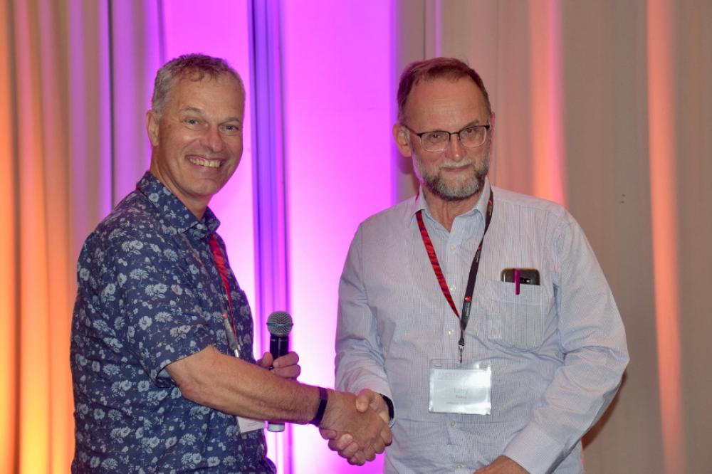 Professor Larry Forbes receiving the 2020 ANZIAM medal from Peter Taylor